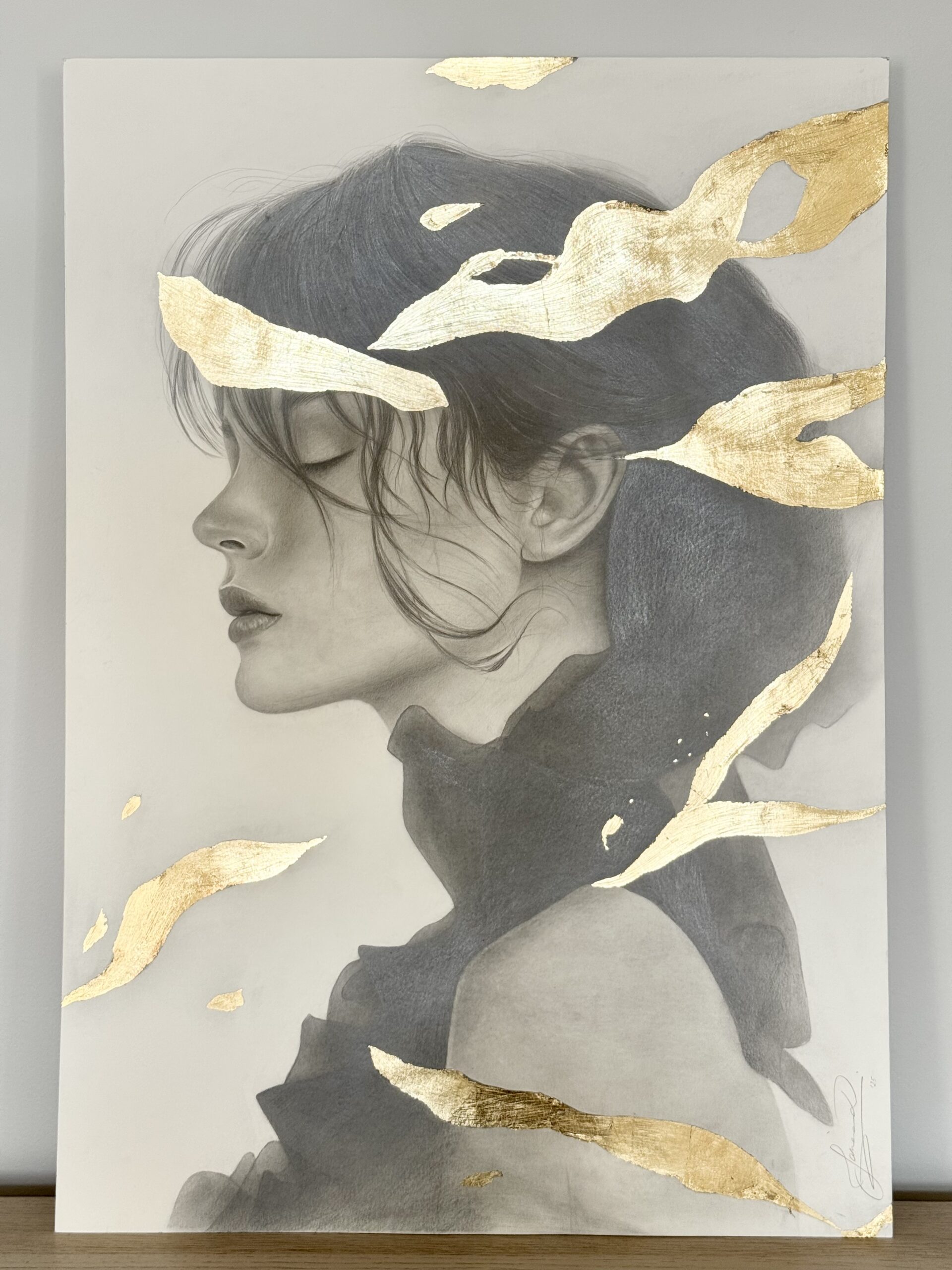 Where Light Rests, graphite and gold leaf on paper by Diana Jarnea, profile portrait